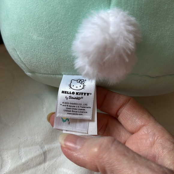Sanrio Hello Kitty Mint Green Plush with White Pom-Pom - Picture 2 of 3